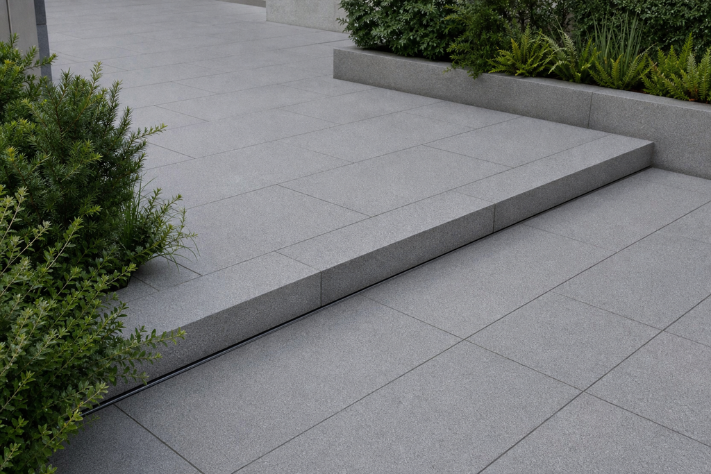 Application visualisation — Bush-Hammered Sesame Grey Natural Granite Paving Stone – Ref. 22634; original product photo and approved sample control