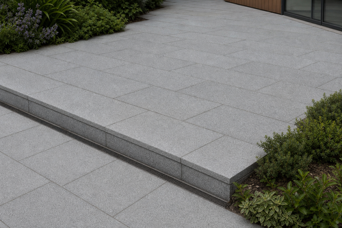 Application visualisation — Bush-Hammered Sesame Grey Natural Granite Paving Stone – Ref. 22663; original product photo and approved sample control